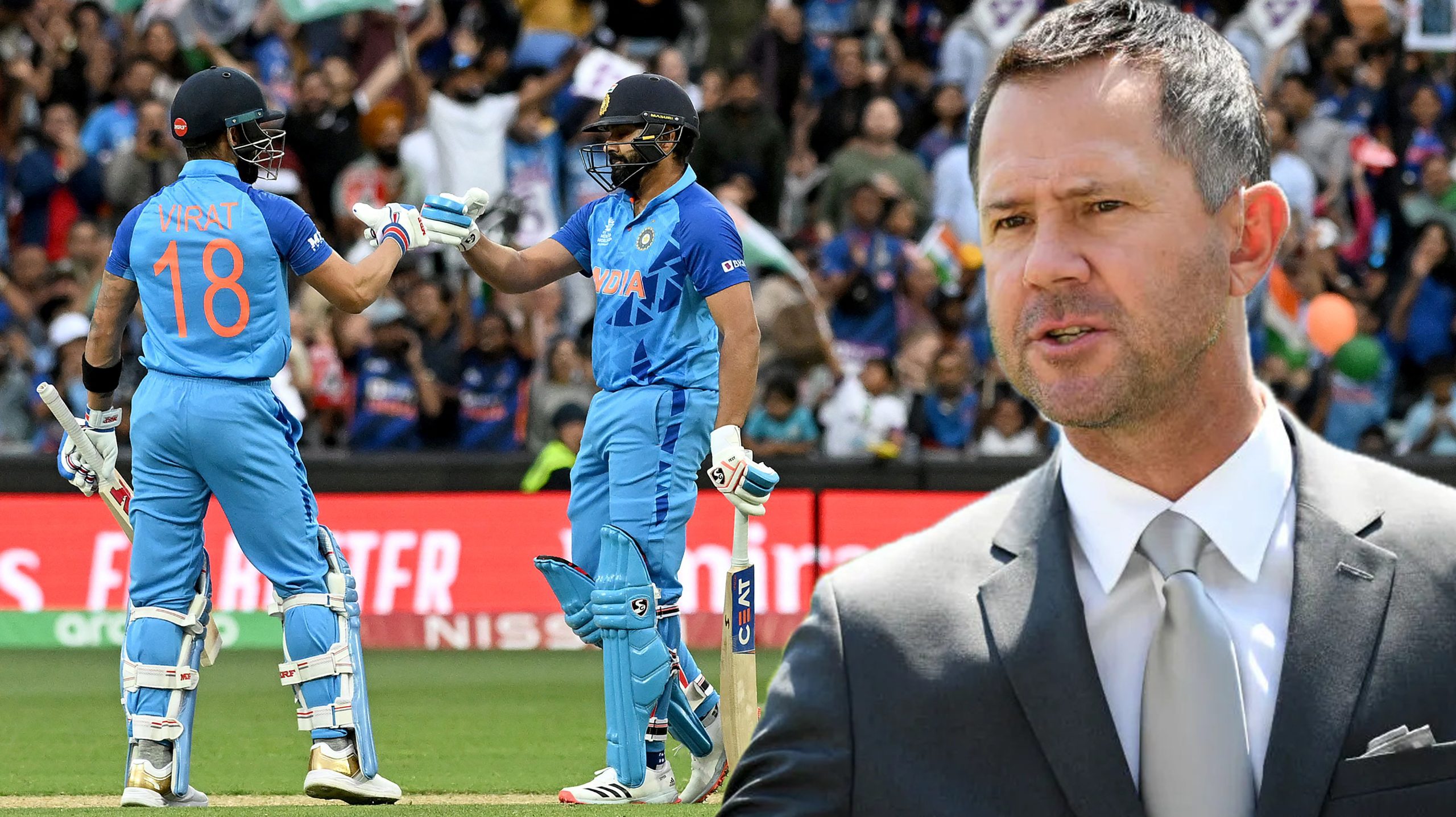India’s Rohit Sharma (R) and Virat Kohli bump gloves during the
